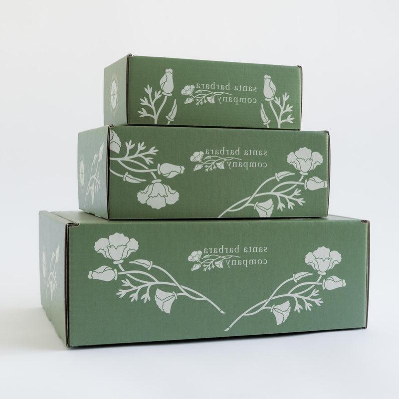 Sustainable mailer gift boxes stacked